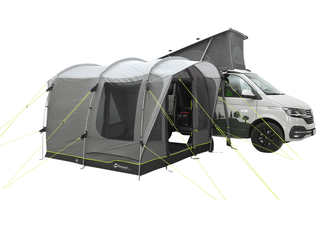 Van with a gray and black camping trailer attached on a white background