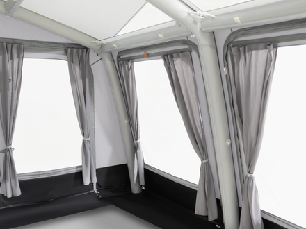 Interior of a caravan with curtains and windows