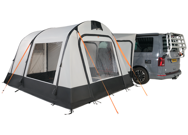 white and black drive away awning attached to a campervan