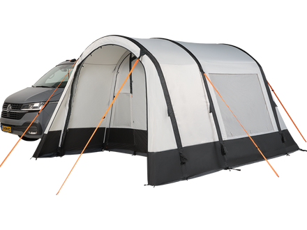 white and black awning attached to a camper van