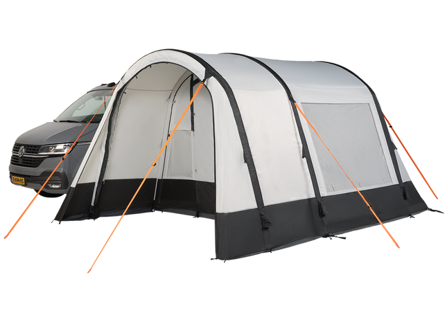 white and black awning attached to a camper van