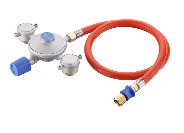 Gas regulator with red hose on a white background