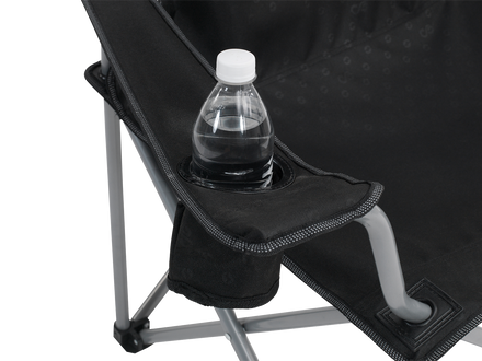 Black folding chair with a water bottle in the cup holder on a white background