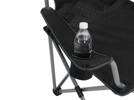 Black camping chair with a bottle holder containing a water bottle on a white background
