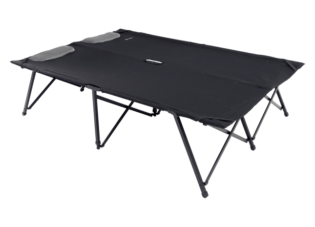 Black camping cot on a white background