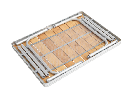 Wooden folding table with metal frame on a white background