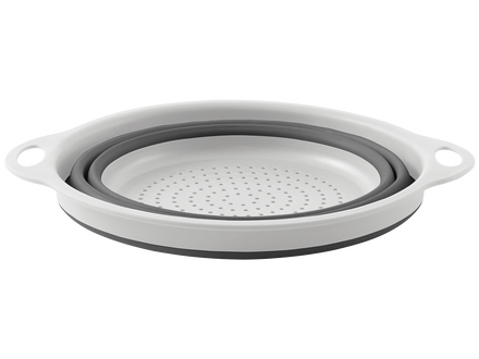 Collapsible silicone strainer on a white background