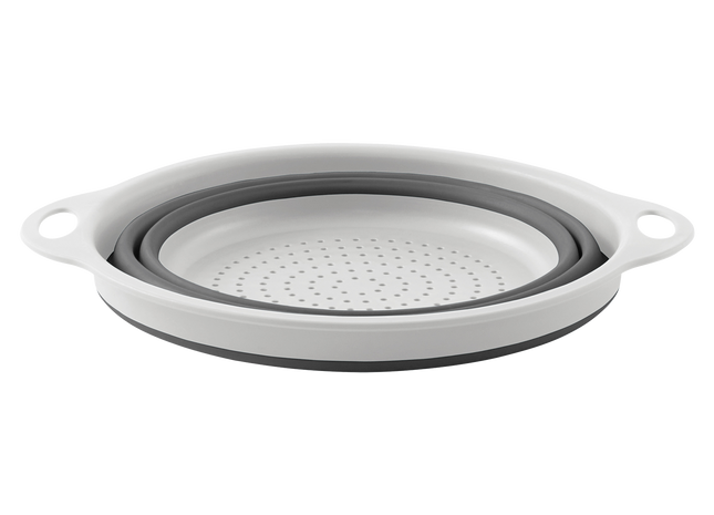 Collapsible silicone strainer on a white background