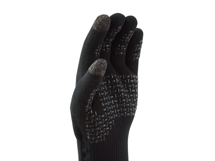 Black glove with textured palm on a white background