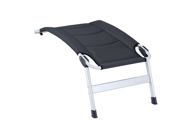 Black chair footrest with white legs on a white background