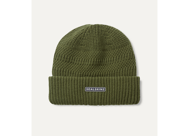 Green beanie with a brand logo on a white background