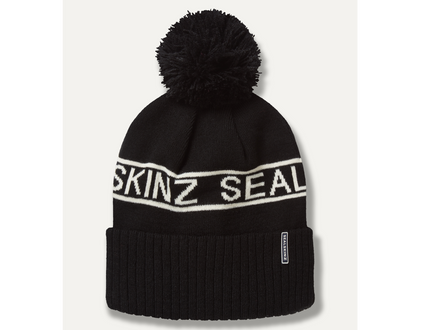 Black beanie with pom-pom and 'SKINZ SEAL' branding on a white background