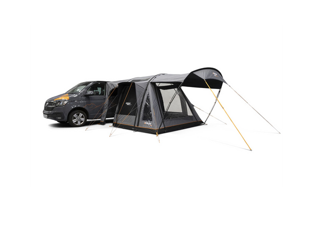 Van with a black and gray inflatable awning attached on a white background