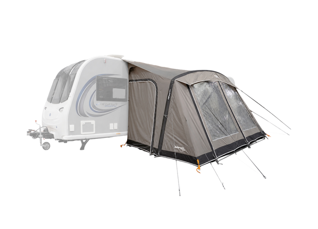 A grey Vango caravan awning on a white caravan with the doors closed, shown on a white background