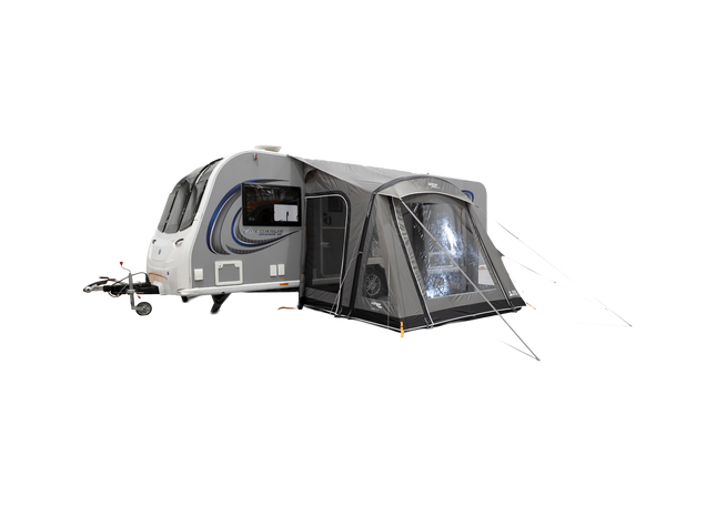 Caravan with an attached awning on a white background