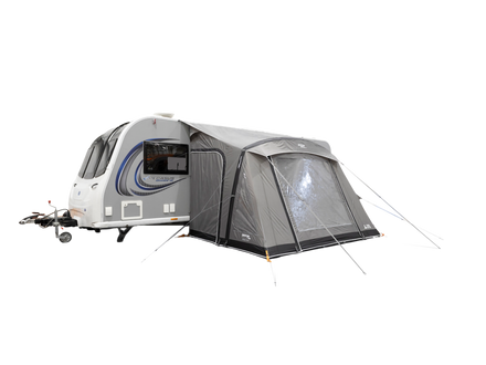 A gray and black pop-up caravan awning tent attached to the side of a white caravan, shown against a solid white background.