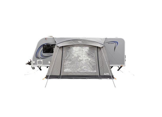 A gray and white travel trailer with an attached gray pop-up canopy tent pitched in front, shown on a plain white background.