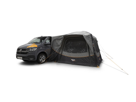 Van with an awning attached on a white background