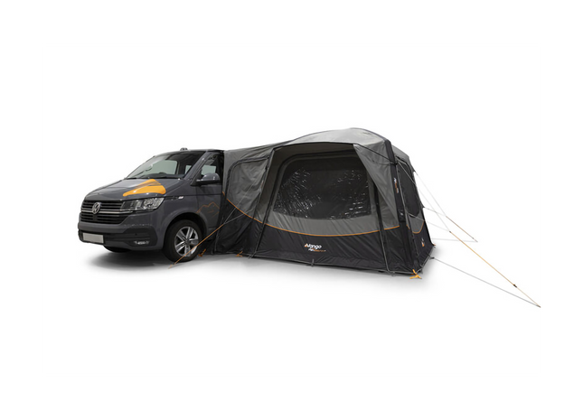 Van with an awning attached on a white background