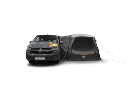 Van with a black and gray awning attached on a white background