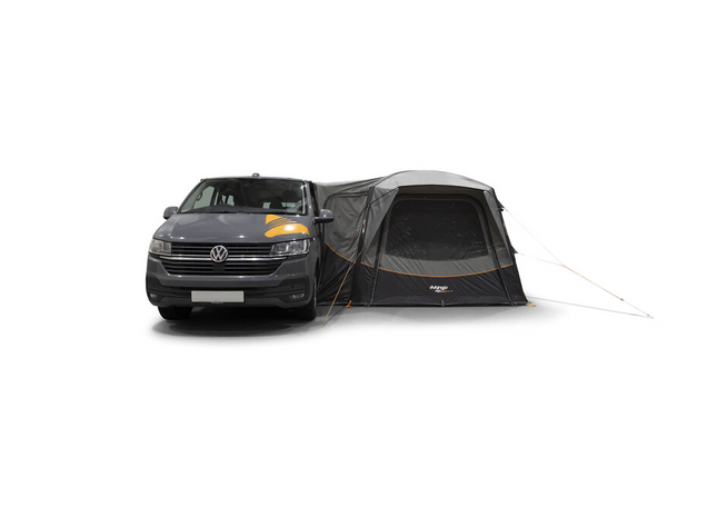 Van with a black and gray awning attached on a white background