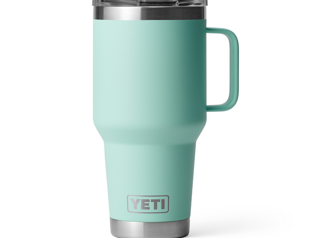 Mint green YETI mug with a handle on a white background