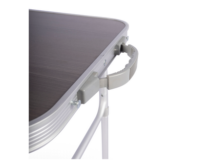 Folding table with a dark surface and metal frame on a white background