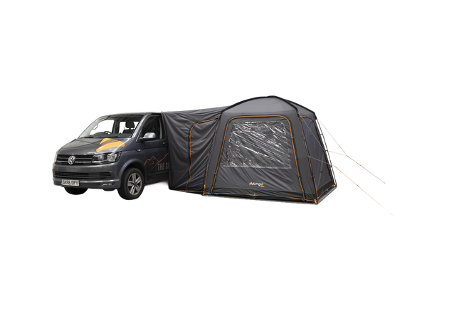 A dark gray VW camper van with an attached black and gray awning tent featuring a clear window, shown on a plain white background.