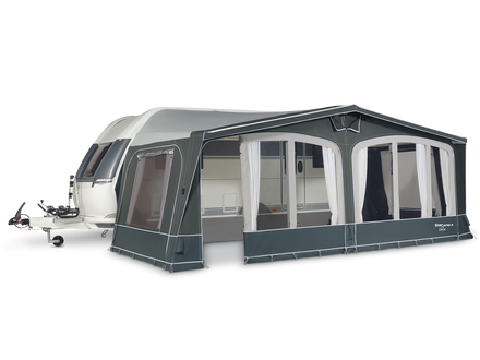 Caravan with a large awning on a white background