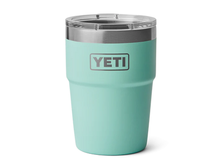 Mint green YETI tumbler with a silver lid on a white background