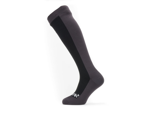 Black knee-high sock on a white background