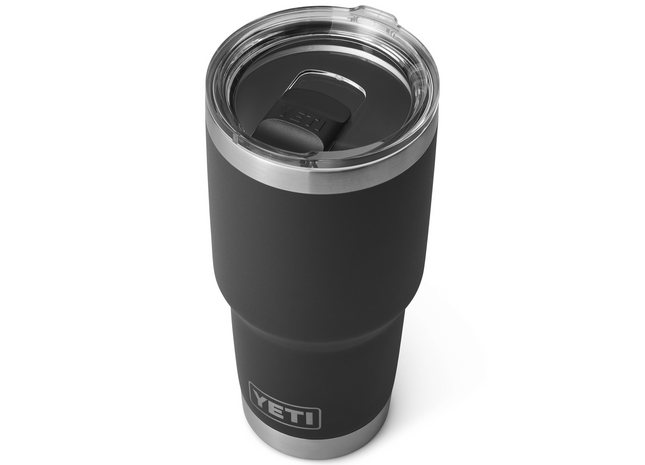 Black YETI tumbler with a clear lid on a white background