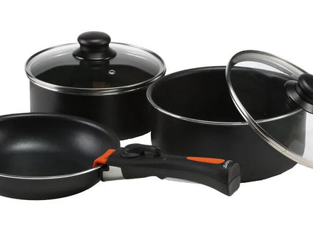 black metal cooking pot set with glass lids on a white background