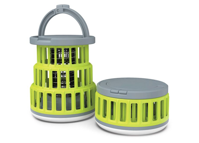 Two green and gray plastic lights on a white background